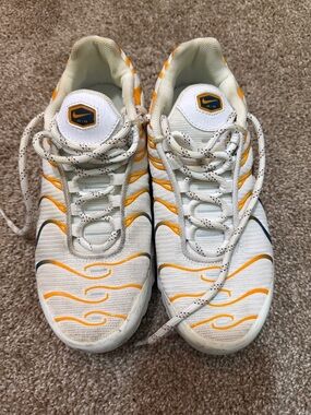 Nike White and Orange Wave-Accent Athletic Sneakers